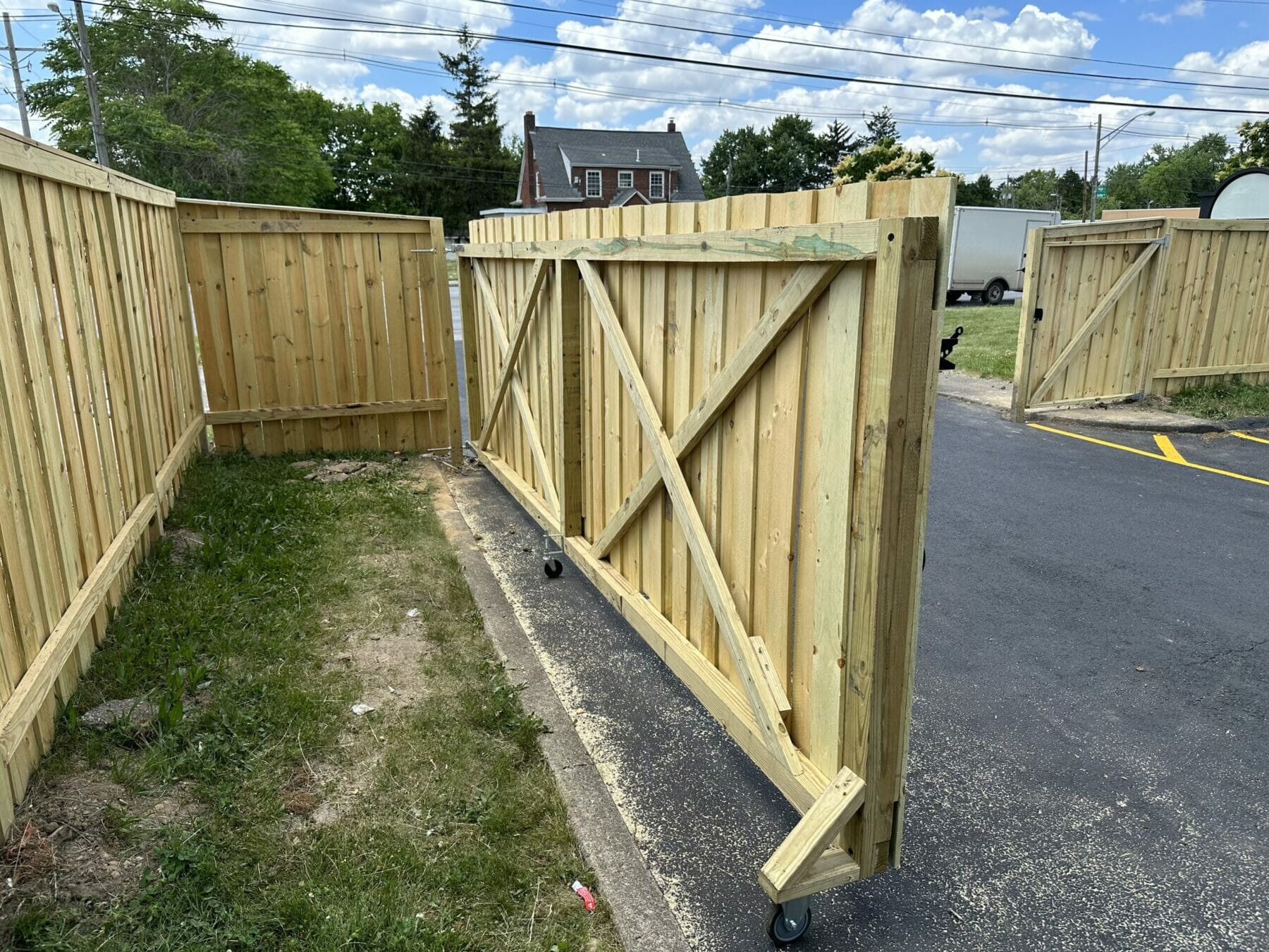 Fence with large rolling gate